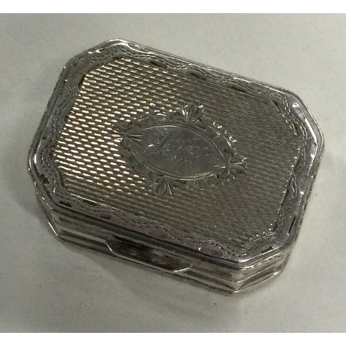 646 - An engine turned silver snuff box with hinged lid bearing import marks. Approx. 22 grams. Est. £20 -... 