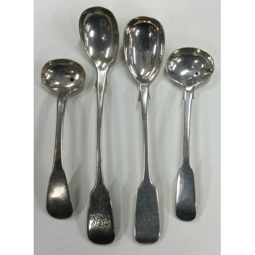 676 - A group of four silver salt and mustard spoons. Various dates and makers. Approx. 48 grams. Est. £30... 