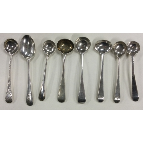 678 - A group of eight silver OE pattern salt spoons. Various dates and makers. Approx. 81 grams. Est. £30... 