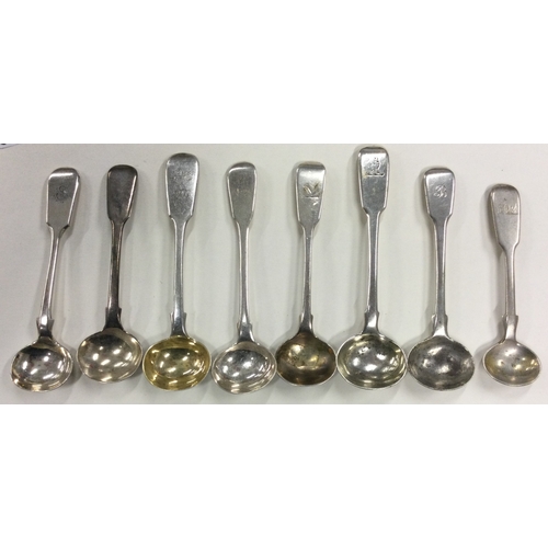 682 - A group of eight silver fiddle pattern salt spoons. Various dates and makers. Approx. 95 grams. Est.... 