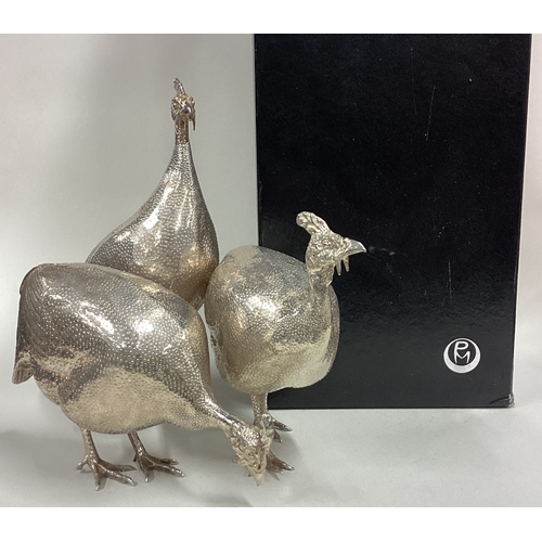 685 - PATRICK MAVROS: A rare suite of three silver guinea fowl sculptures of textured design. Fully hallma... 