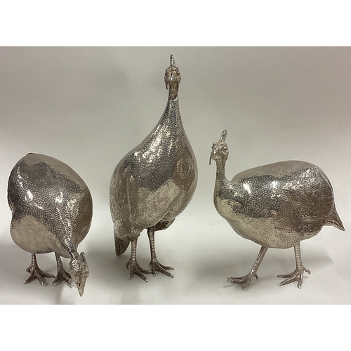 685 - PATRICK MAVROS: A rare suite of three silver guinea fowl sculptures of textured design. Fully hallma... 