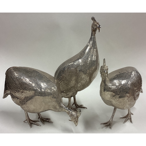 685 - PATRICK MAVROS: A rare suite of three silver guinea fowl sculptures of textured design. Fully hallma... 