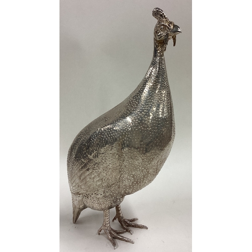 685 - PATRICK MAVROS: A rare suite of three silver guinea fowl sculptures of textured design. Fully hallma... 