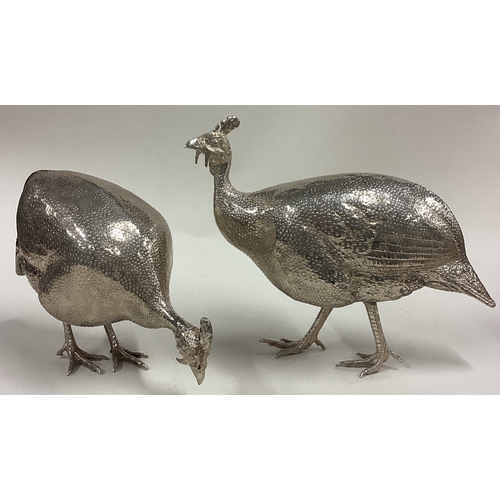 685 - PATRICK MAVROS: A rare suite of three silver guinea fowl sculptures of textured design. Fully hallma... 