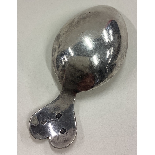 69 - A heart shaped silver caddy spoon. Approx. 10 grams. Est. £30 - £40.