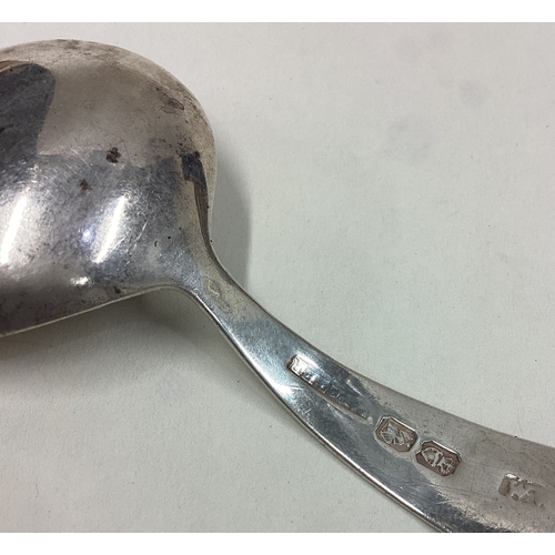 699 - DUBLIN: A Georgian silver OE pattern caddy spoon of plain form. By W Peter. Approx. 19 grams. Est. £... 