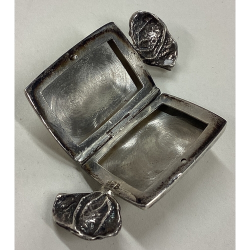 78 - A novelty engine turned silver sweet / pill box with hinged lid. London 2000. Approx. 7 grams. Est. ... 