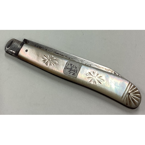 88 - A Victorian silver and carved MOP travelling fruit knife. Sheffield 1899. Approx. 25 grams. Est. £30... 