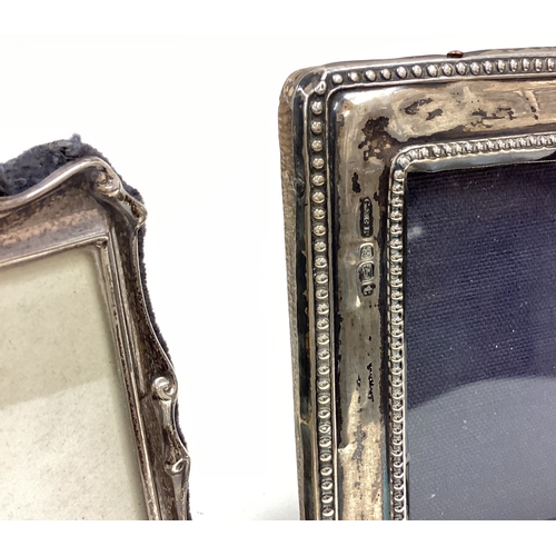 97 - Two rectangular silver picture frames. Approx. 123 grams of gross weight. Est. £30 - £40.