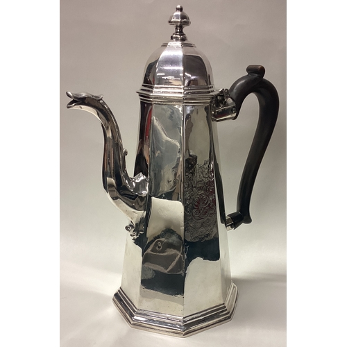 115 - An octagonal George I silver coffee pot. London 1715. By Richard Green. Approx. 770 grams. Est. £350... 