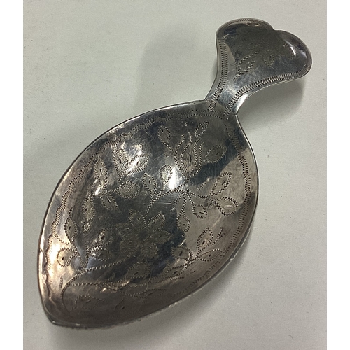 69 - A heart shaped silver caddy spoon. Approx. 10 grams. Est. £30 - £40.