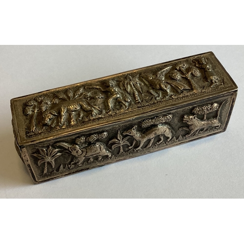 664 - An Indian silver box decorated with animals. Approx. 85 grams. Est. £20 - £30.