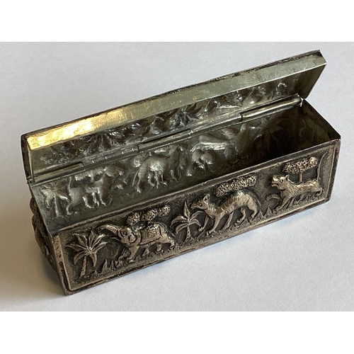 664 - An Indian silver box decorated with animals. Approx. 85 grams. Est. £20 - £30.