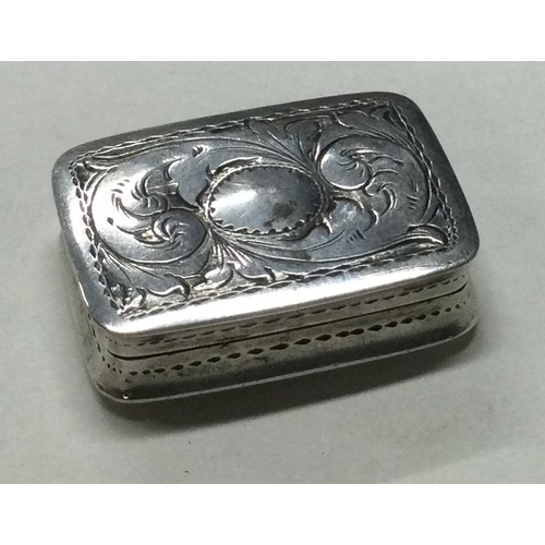 100 - A silver vinaigrette. Birmingham 1830. By Nathaniel Mills. Approx. 7 grams. Est. £60 - £80.