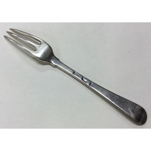 113 - An 18th Century silver three prong fork. Marked to base. Approx. 34 grams. Est. £80 - £120.