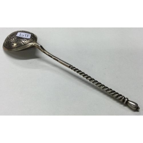 119 - A 19th Century Russian engraved silver spoon. Dated 1873. Approx. 22 grams. Est. £30 - £50.