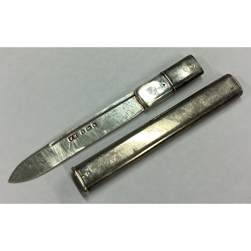 12 - A cased silver travelling knife. Birmingham 1902. Approx. 10 grams. Est. £10 - £20.