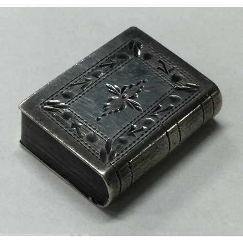 124 - An engraved silver snuff box in the form of a book with hinged cover. Approx. 6 grams. Est. £30 - £4... 