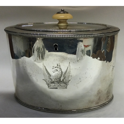 130 - An 18th Century George III silver tea caddy with crested dragon to centre. Marked to base and lion m... 