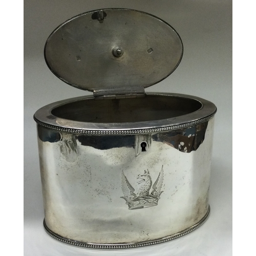 130 - An 18th Century George III silver tea caddy with crested dragon to centre. Marked to base and lion m... 