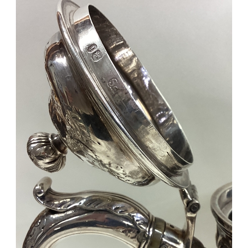 148 - PAUL STORR: A good decorative chased silver coffee pot. London 1824. Approx. 1000 grams. Est. £600 -... 