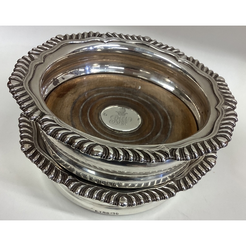 149 - An oversized pair of Victorian silver wine coasters. Sheffield 1865. By Creswick & Co. Approx. 707 g... 