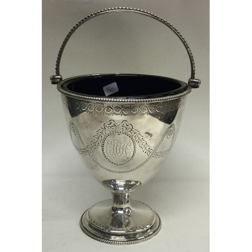 16 - A good 18th Century George III silver swing handled basket with BGL. London 1779. By Benjamin Davenp... 