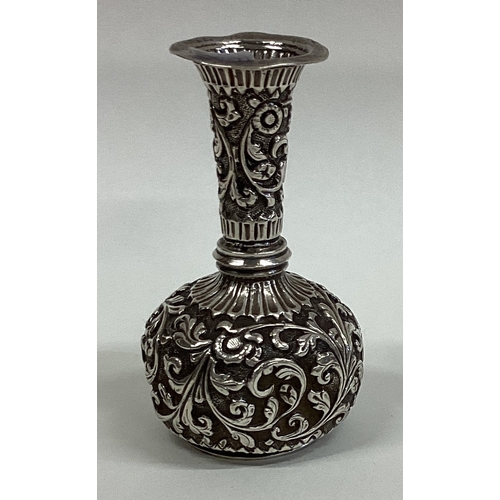 165 - A Persian silver vase with chased decoration. Approx. 52 grams. Est. £40 - £60.