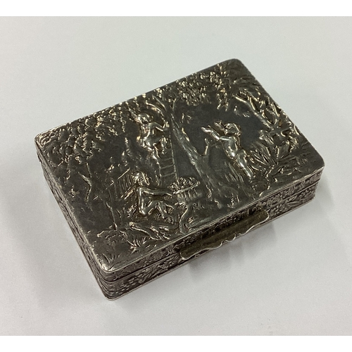 186 - A chased silver box bearing import marks. Approx. 15 grams. Est. £30 - £50.