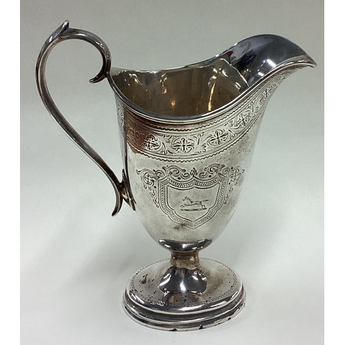 187 - A Georgian style silver cream jug. London 1881. Approx. 183 grams. Est. £150 - £200.