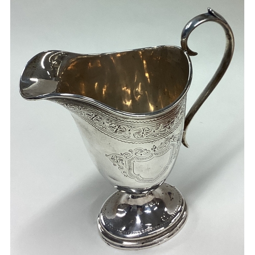 187 - A Georgian style silver cream jug. London 1881. Approx. 183 grams. Est. £150 - £200.