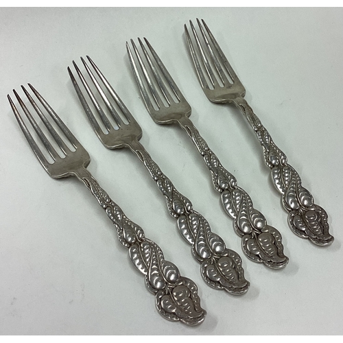 196 - TIFFANY & CO: A set of four silver forks. Approx. 204 grams. Est. £200 - £300.