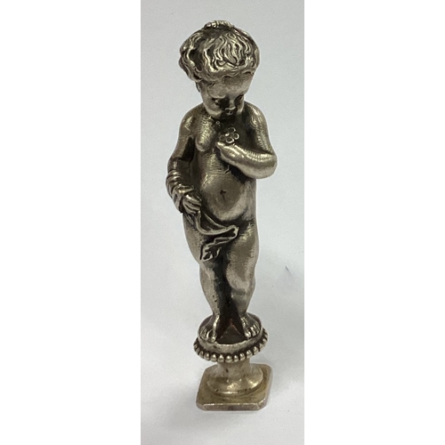 2 - A heavy cast silver figure of a child in standing position. Apparently unmarked. Approx. 79 grams. E... 