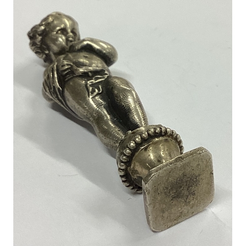 2 - A heavy cast silver figure of a child in standing position. Apparently unmarked. Approx. 79 grams. E... 