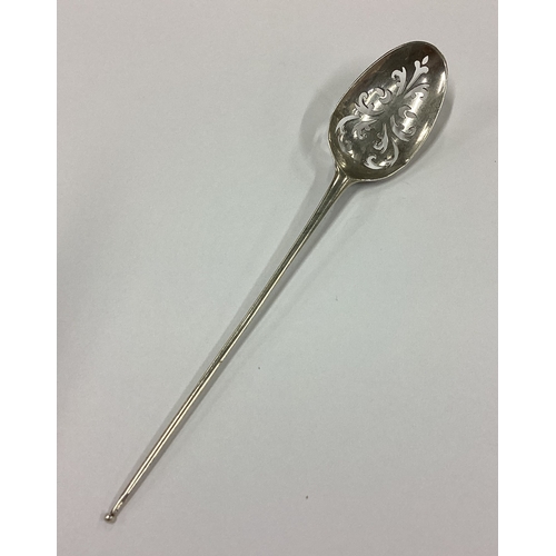 200 - An 18th Century silver rat tail mote spoon. Maker's mark only. Approx. 6 grams. Est. £100 - £150.