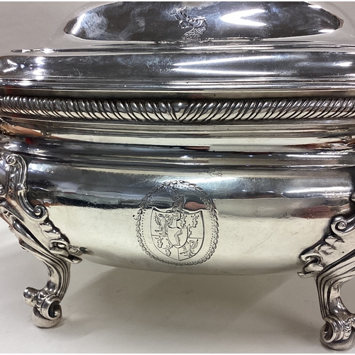 212 - A large and impressive 18th Century George III silver soup tureen with central armorial. London 1755... 