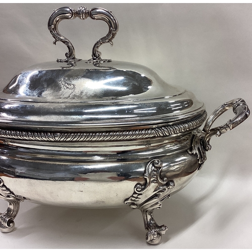 212 - A large and impressive 18th Century George III silver soup tureen with central armorial. London 1755... 