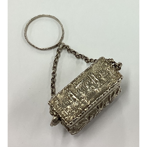 215 - A rare novelty 19th Century Victorian silver vinaigrette in the form of a handbag depicting Windsor ... 