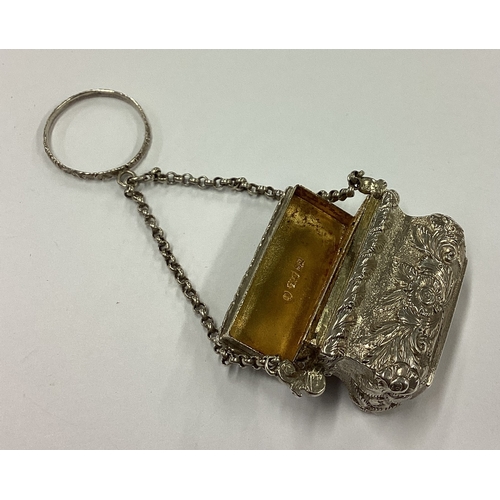 215 - A rare novelty 19th Century Victorian silver vinaigrette in the form of a handbag depicting Windsor ... 