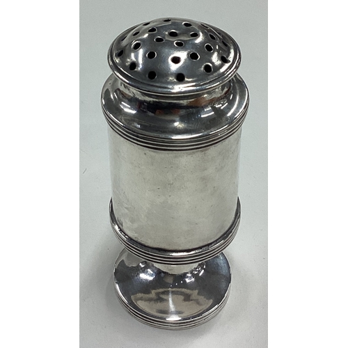 226 - A good 18th Century Indian Colonial silver salt shaker. By T&Co. Maker's mark and lion only. Approx.... 