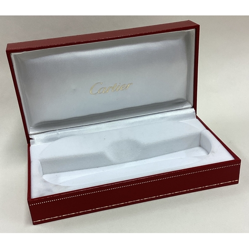 227 - CARTIER: A silver presentation box. Est. £30 - £50.