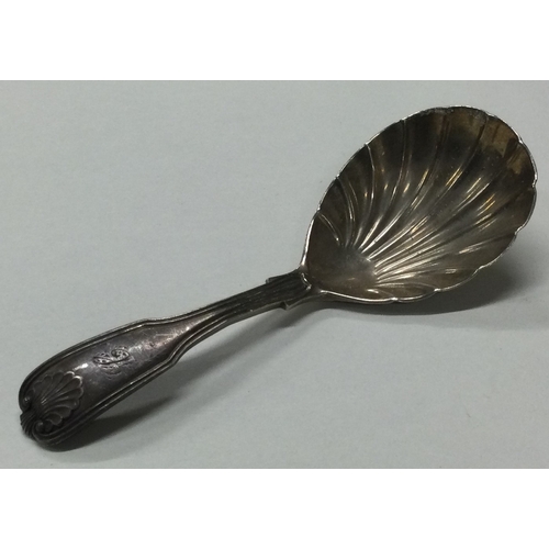 23 - A Georgian silver caddy spoon with fluted bowl. London 1813. By WC. Approx. 28 grams. Est. £30 - £50... 