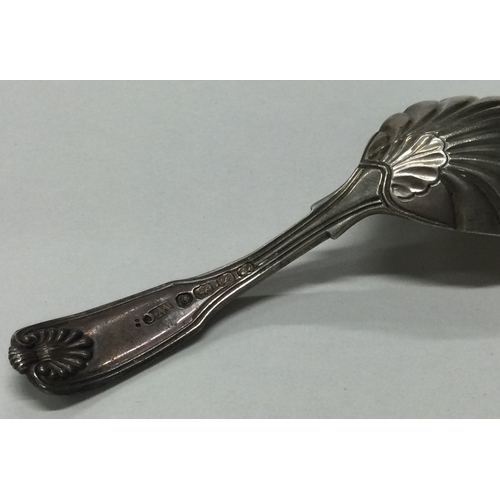 23 - A Georgian silver caddy spoon with fluted bowl. London 1813. By WC. Approx. 28 grams. Est. £30 - £50... 