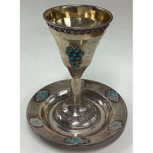 237 - A Judaica silver goblet on stand set with blue stones. Marked Sterling. Approx. 85 grams. Est. £100 ... 