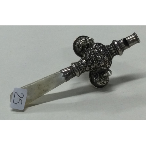 25 - A silver baby's rattle with MOP handle. Birmingham. Approx. 13 grams. Est. £30 - £50.