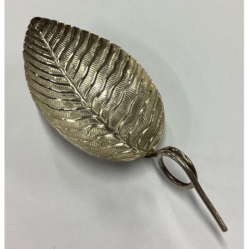 251 - A George III silver chased leaf caddy spoon. Birmingham 1801. By John Taylor. Approx. 7 grams. Est. ... 