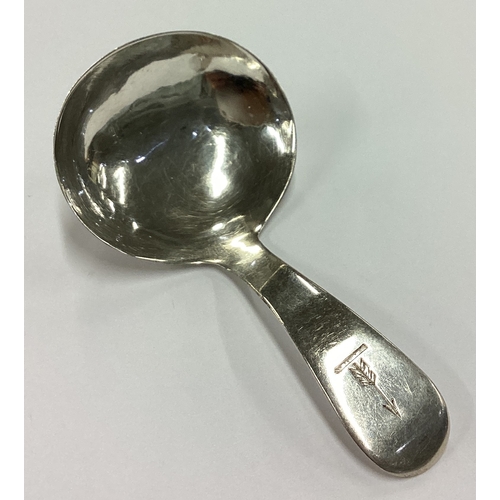 258 - A plain George III crested silver caddy spoon. London 1815. By Sarah & John William Blake. Approx. 1... 