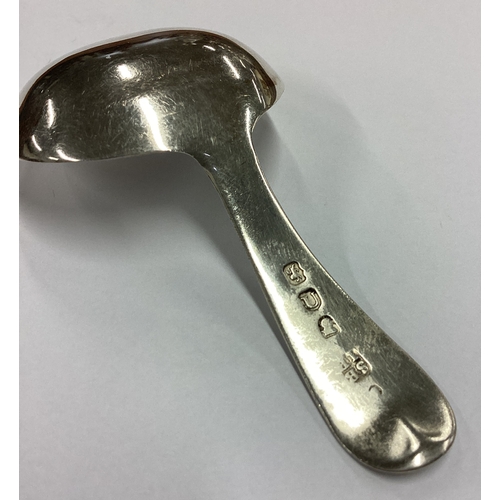 258 - A plain George III crested silver caddy spoon. London 1815. By Sarah & John William Blake. Approx. 1... 