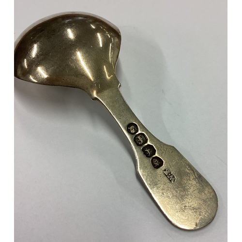 259 - A George III silver shell back caddy spoon. London 1821. By William Eley. Approx. 13 grams. Est. £50... 